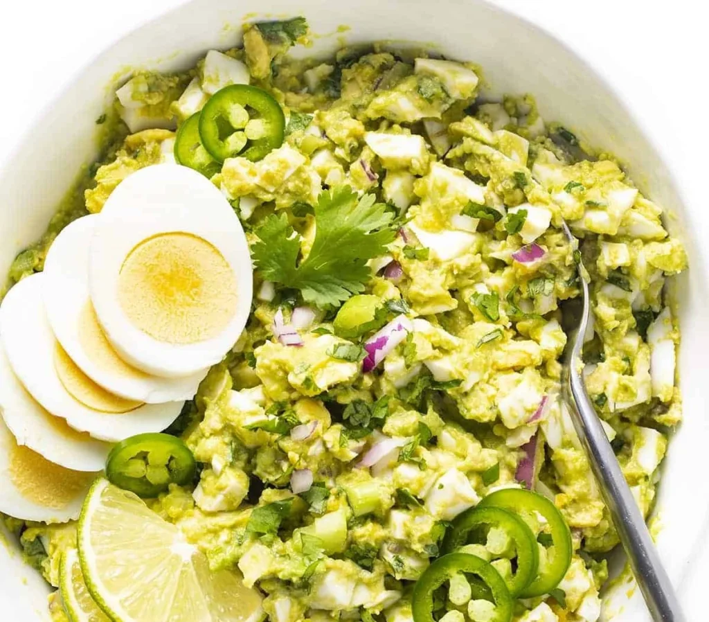 Delicious Avocado Egg Salad served in a bowl with fresh ingredients