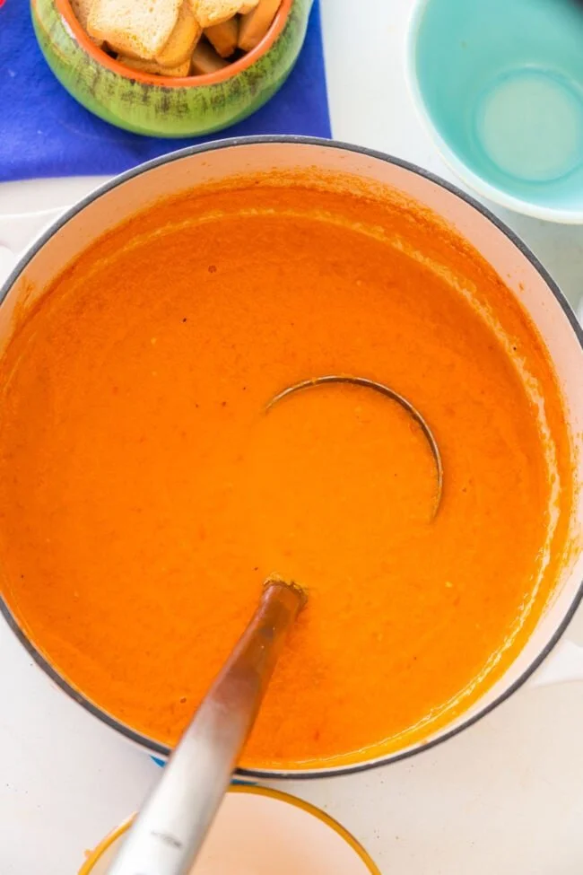 Fresh tomato soup made with ripe Roma tomatoes, garnished and ready to serve.