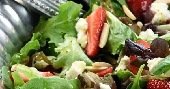 Colorful Easter salad with seasonal vegetables and eggs for a festive meal.