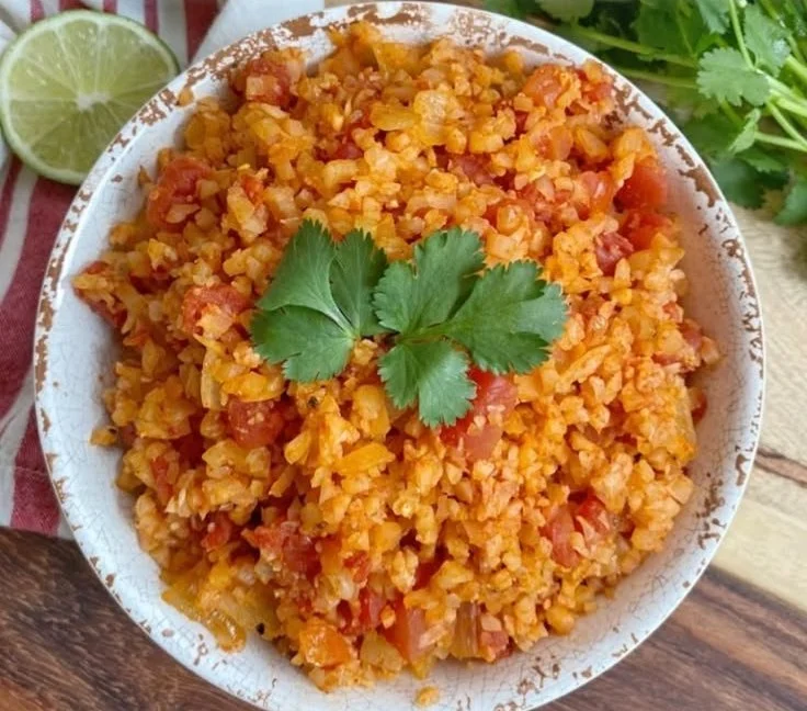 Bowl of easy Spanish cauliflower rice with spices and vegetables