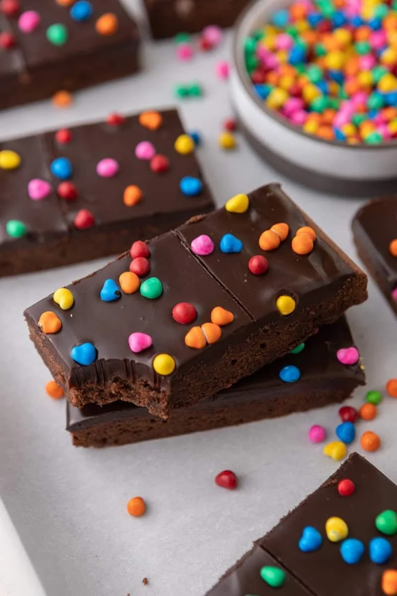 Decadent gourmet Cosmic Brownies with colorful sprinkles and rich chocolate frosting