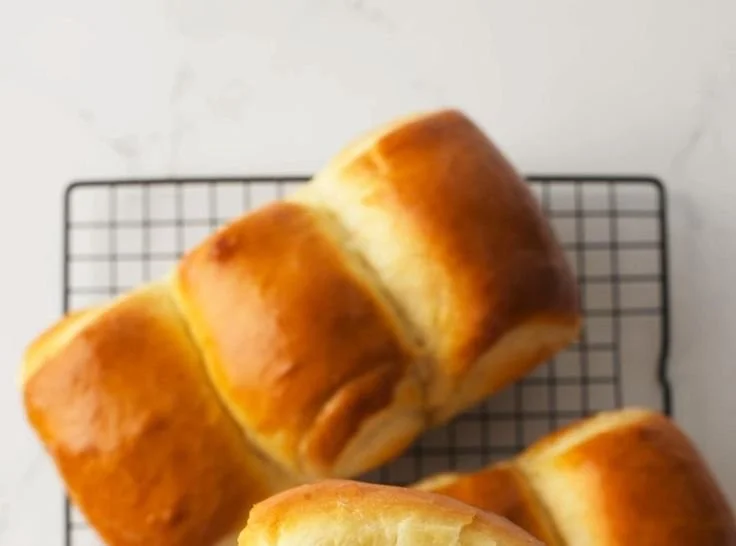 Freshly baked Japanese milk bread showcasing its soft and fluffy texture