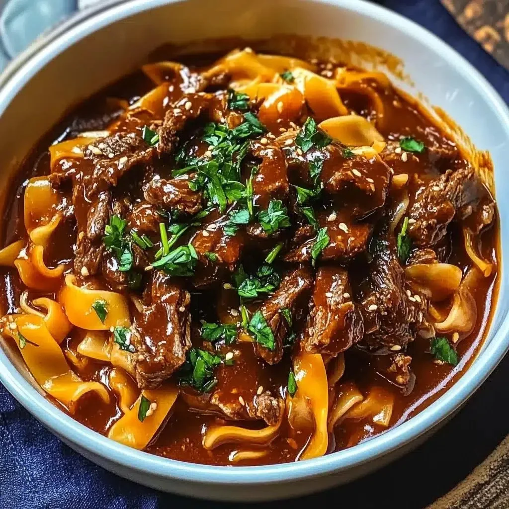 Delicious bowl of Korean beef noodles garnished with green onions and sesame seeds