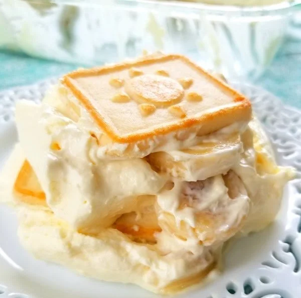 Delicious Paula Deen's Banana Pudding served in a bowl with banana slices on top