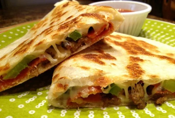 Delicious pizza dillas with melted cheese and fresh toppings
