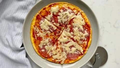 Delicious Pizza Eggs with toppings and cheese, perfect for breakfast or brunch.