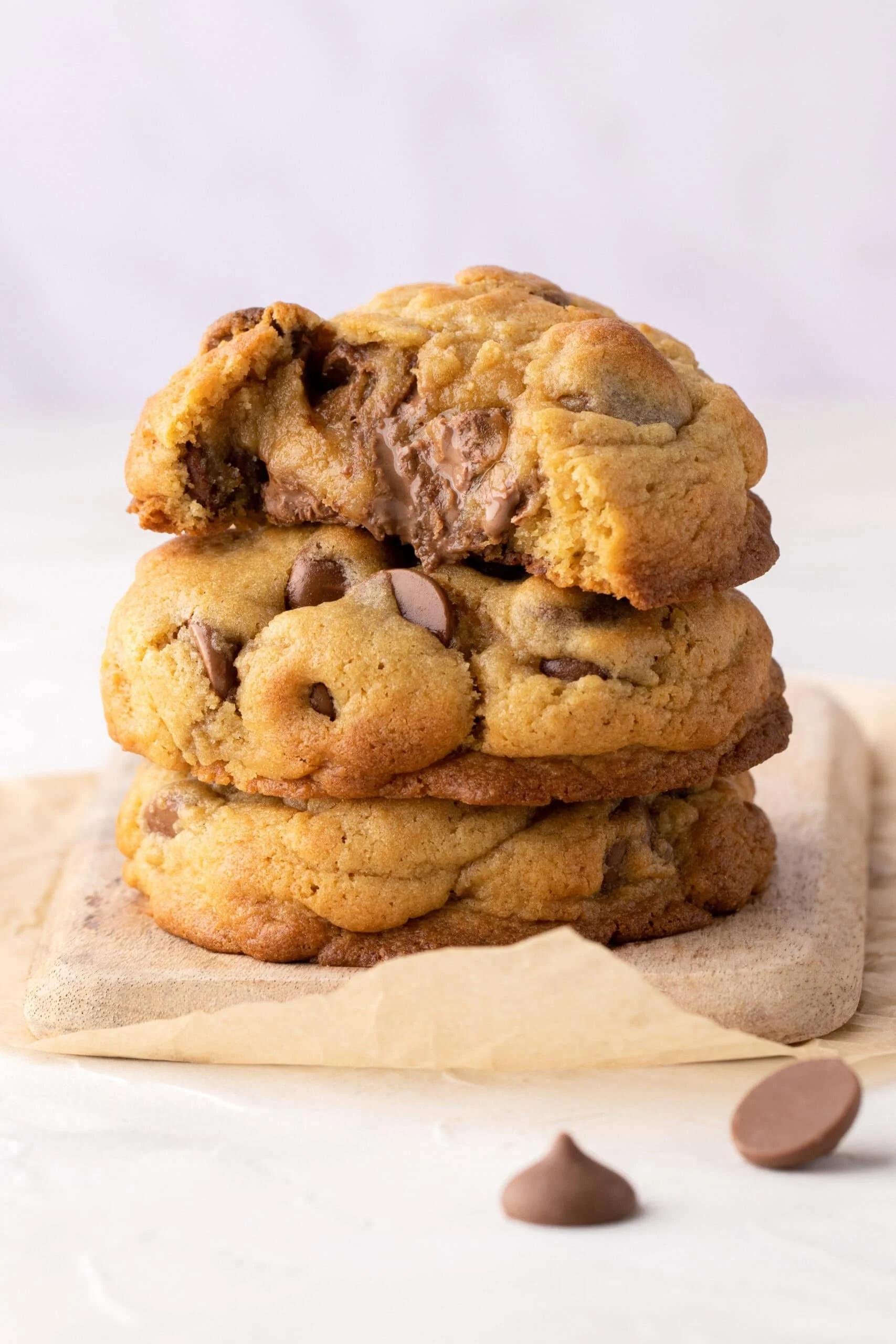 Thick, homemade chocolate chip cookies with melted chocolate chunks.