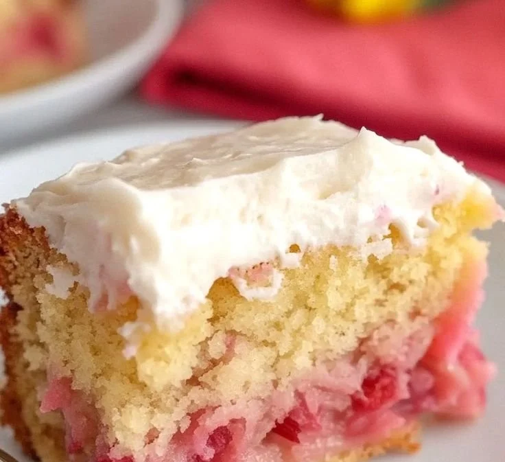 Slice of best rhubarb cake made with cake mix on a plate