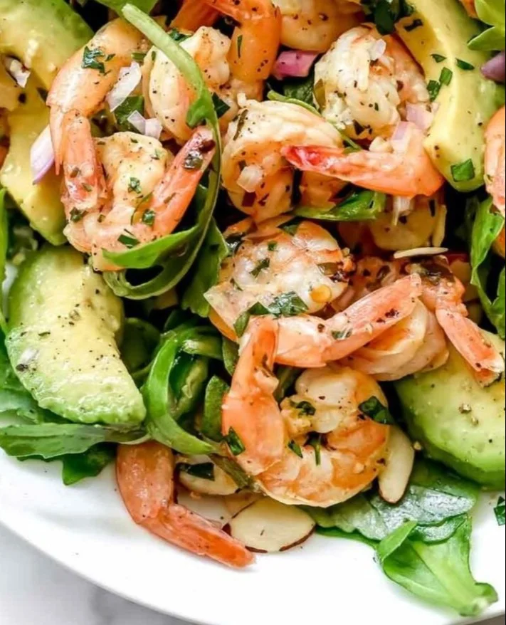 Citrus Shrimp and Avocado Salad in a bowl with vibrant ingredients