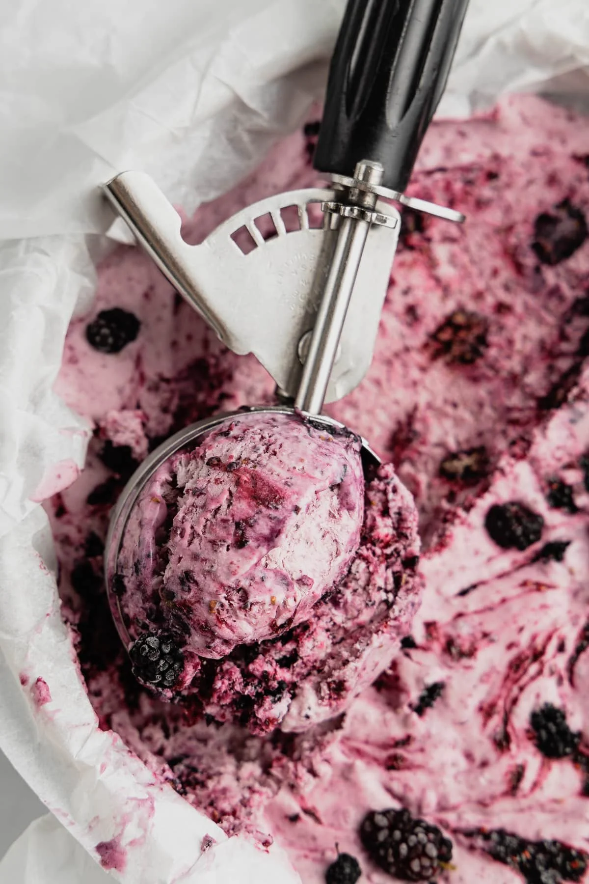 Delicious homemade no-churn mulberry ice cream in a bowl