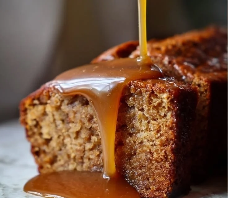 Delicious homemade banana syrup in a glass jar with fresh bananas
